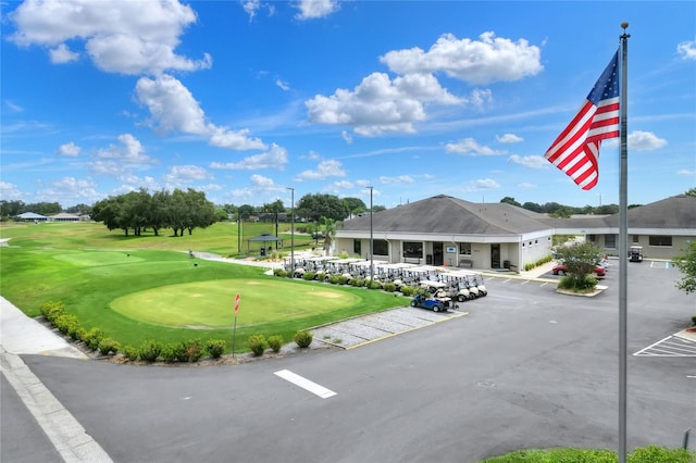 6065 Magpie Dr, Lakeland, FL 33809 - view of building exterior featuring uncovered parking and golf course view