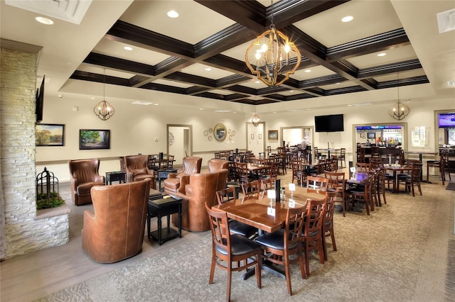 6065 Magpie Dr, Lakeland, FL 33809 - dining space featuring a chandelier, beamed ceiling, coffered ceiling, and ornamental molding