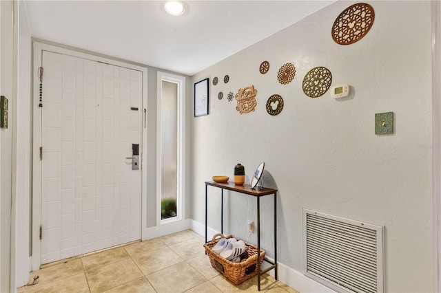 321 Birch Way Unit 321, Haines City, FL 33844 - foyer with light tile patterned flooring and baseboards