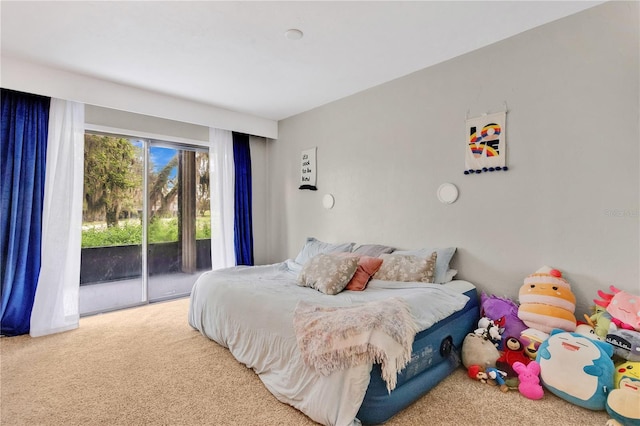 321 Birch Way Unit 321, Haines City, FL 33844 - bedroom featuring access to exterior and carpet floors