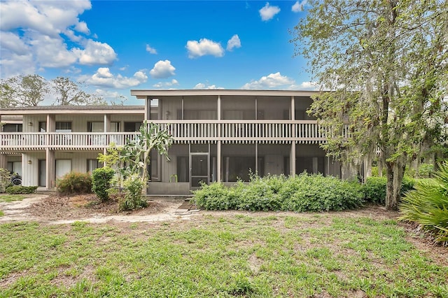 321 Birch Way Unit 321, Haines City, FL 33844 - rear view of house featuring a sunroom
