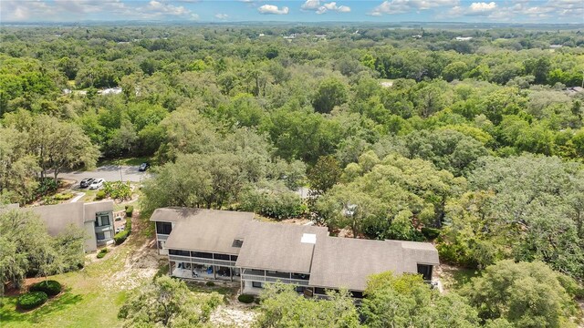 321 Birch Way Unit 321, Haines City, FL 33844 - aerial view of property and surrounding area with a heavily wooded area