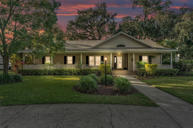 5108 Waterwood Dr, Bartow, FL 33830 - view of front of home featuring a porch and a front yard