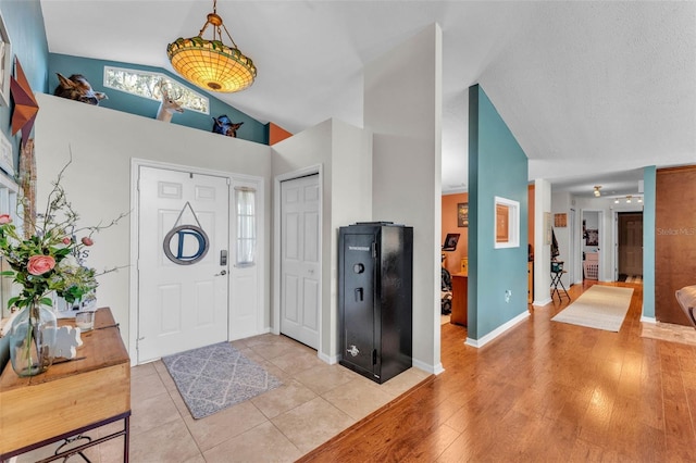 5108 Waterwood Dr, Bartow, FL 33830 - foyer featuring high vaulted ceiling and light tile patterned flooring