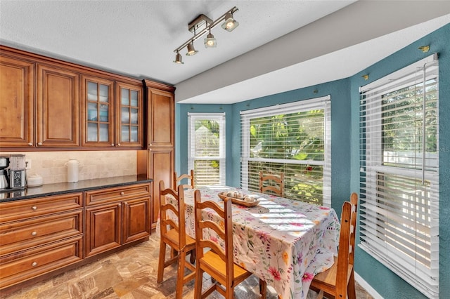 5108 Waterwood Dr, Bartow, FL 33830 - dining room featuring a textured ceiling