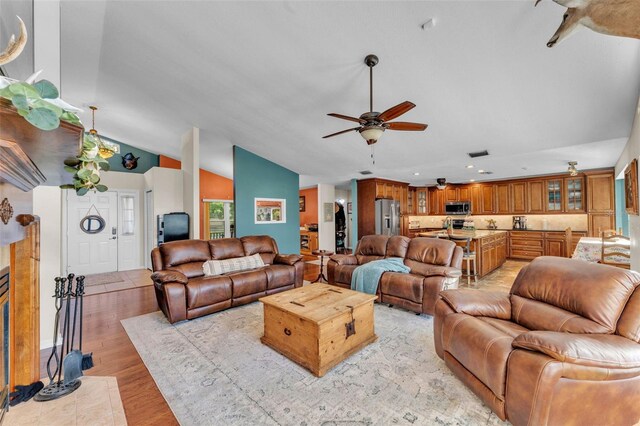 5108 Waterwood Dr, Bartow, FL 33830 - living room with recessed lighting, ceiling fan, light wood-style floors, and lofted ceiling