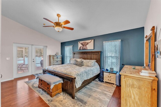 5108 Waterwood Dr, Bartow, FL 33830 - bedroom featuring access to outside, french doors, vaulted ceiling, wood finished floors, and ceiling fan