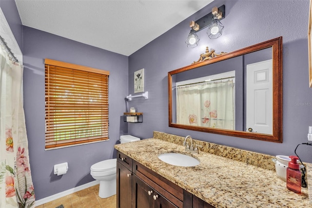 5108 Waterwood Dr, Bartow, FL 33830 - bathroom featuring vanity, toilet, baseboards, and curtained shower