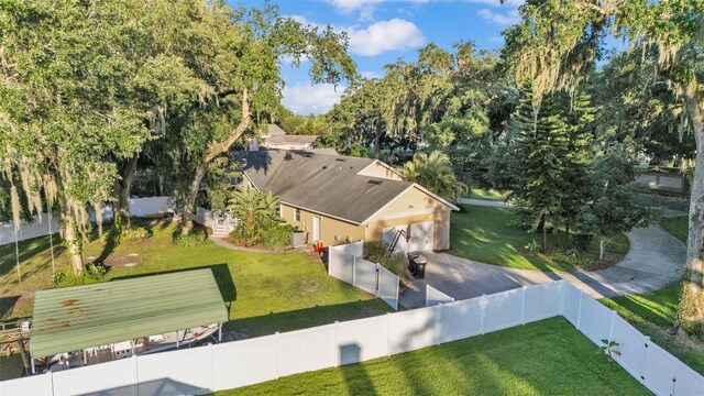 5108 Waterwood Dr, Bartow, FL 33830 - view of subject property featuring a tree filled landscape