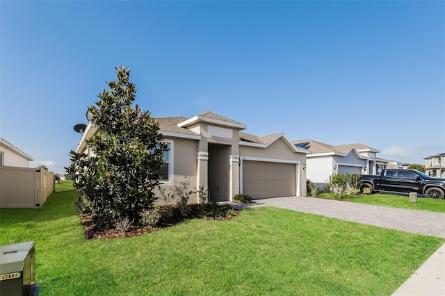 606 Fairview Ave Unit 244, Haines City, FL 33844 - view of front of home with driveway, a garage, stucco siding, and a shingled roof