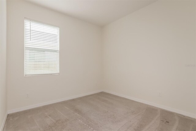 606 Fairview Ave Unit 244, Haines City, FL 33844 - empty room featuring light colored carpet and baseboards