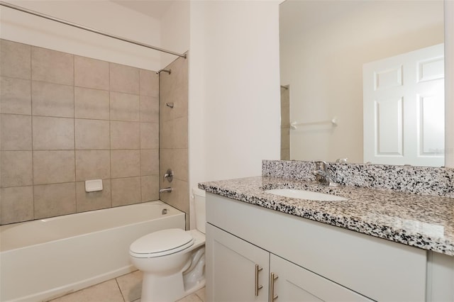 606 Fairview Ave Unit 244, Haines City, FL 33844 - full bathroom with vanity, washtub / shower combination, toilet, and tile patterned floors