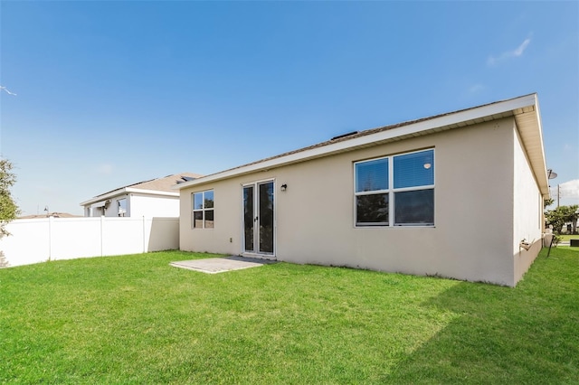 606 Fairview Ave Unit 244, Haines City, FL 33844 - back of house featuring stucco siding