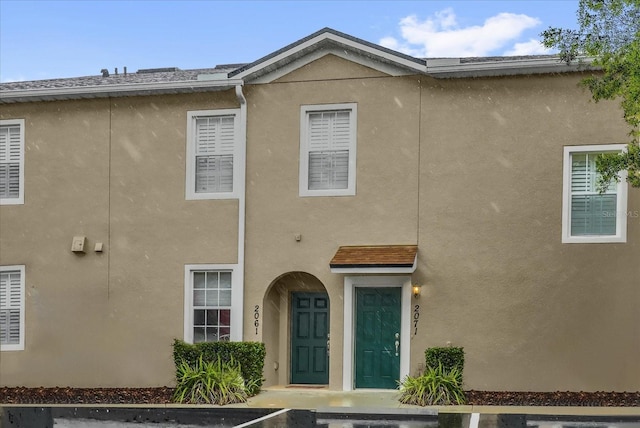 2061 Crestdale Ln Unit 60, Lake Mary, FL 32746 - view of front of home featuring stucco siding