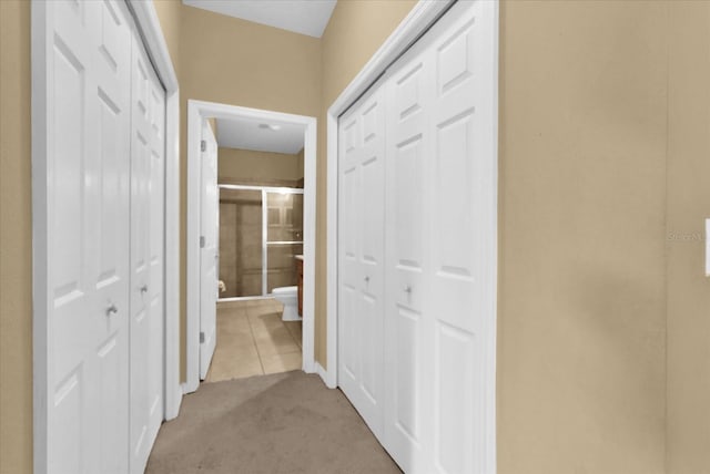 2061 Crestdale Ln Unit 60, Lake Mary, FL 32746 - hallway featuring light carpet