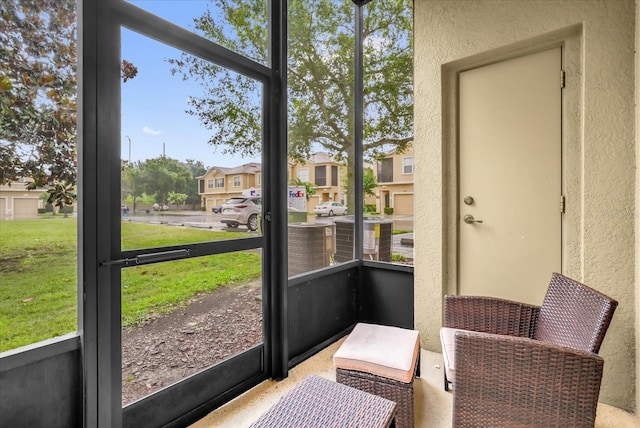 2061 Crestdale Ln Unit 60, Lake Mary, FL 32746 - sunroom featuring a residential view
