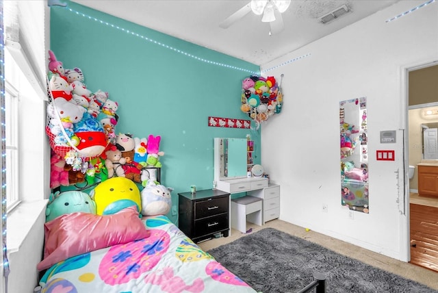 2061 Crestdale Ln Unit 60, Lake Mary, FL 32746 - carpeted bedroom featuring a ceiling fan