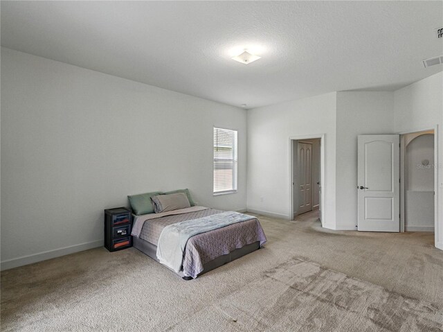 1547 Cordgrass Way, Lakeland, FL 33813 - bedroom with light carpet and baseboards