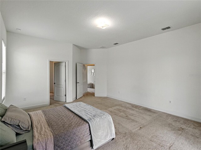 1547 Cordgrass Way, Lakeland, FL 33813 - bedroom featuring light carpet and baseboards