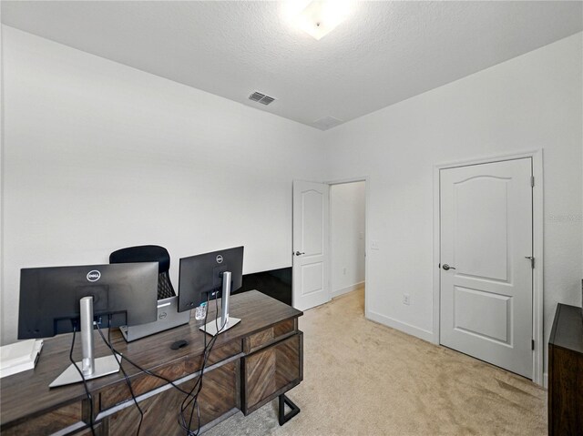 1547 Cordgrass Way, Lakeland, FL 33813 - office area featuring light colored carpet, baseboards, and a textured ceiling