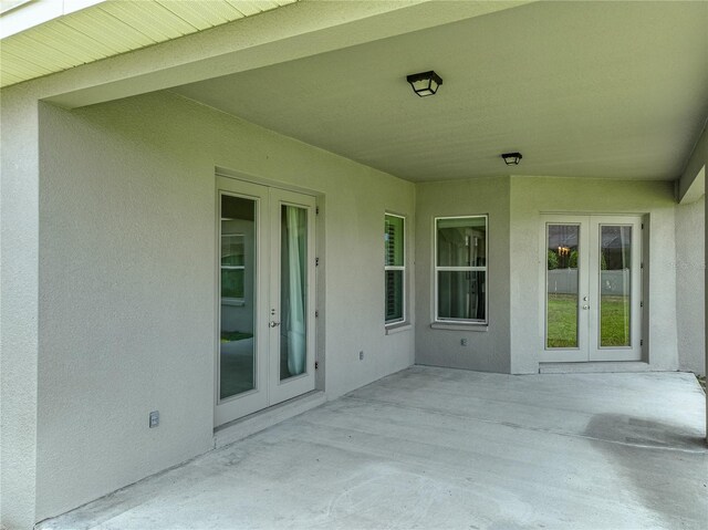 1547 Cordgrass Way, Lakeland, FL 33813 - view of patio / terrace featuring french doors