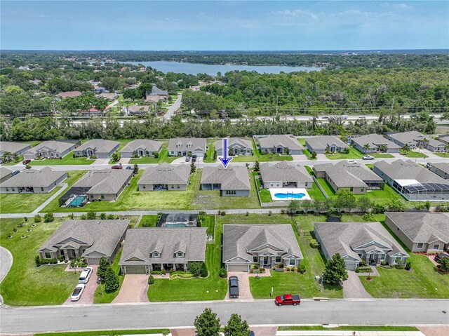 1547 Cordgrass Way, Lakeland, FL 33813 - aerial view of residential area featuring a large body of water