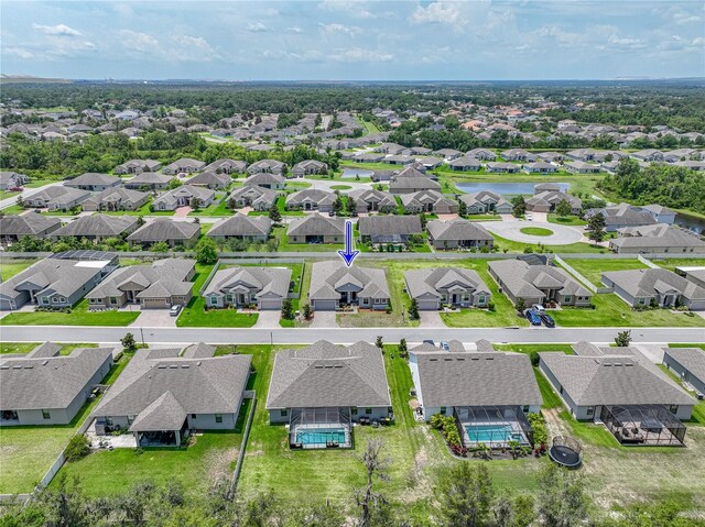 1547 Cordgrass Way, Lakeland, FL 33813 - aerial view of residential area featuring a pool and a nearby body of water