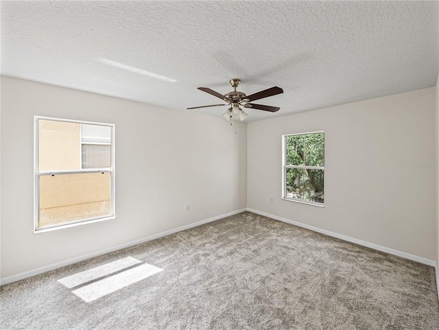 143 Alfani St, Davenport, FL 33896 - unfurnished room featuring carpet, a ceiling fan, baseboards, and a textured ceiling