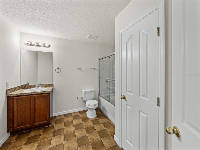 143 Alfani St, Davenport, FL 33896 - bathroom featuring vanity, baseboards, toilet, bath / shower combo with glass door, and a textured ceiling