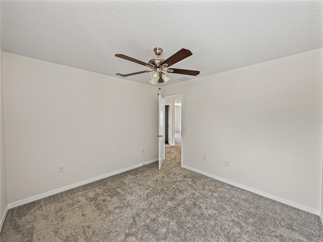 143 Alfani St, Davenport, FL 33896 - empty room featuring light colored carpet, a ceiling fan, and baseboards