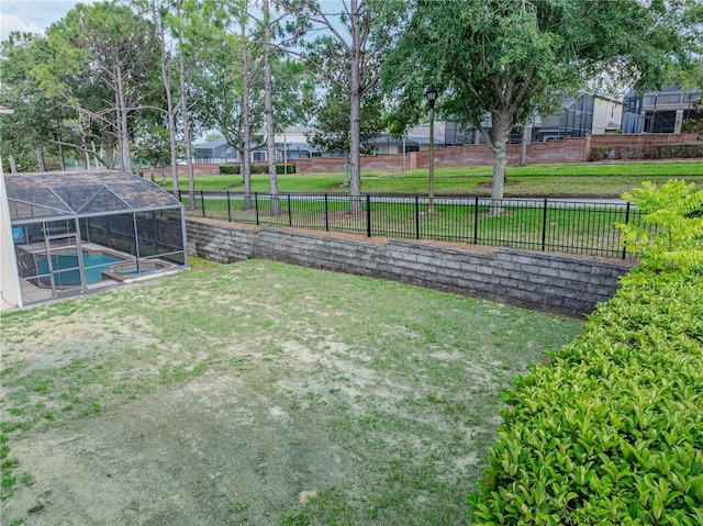 143 Alfani St, Davenport, FL 33896 - view of yard featuring an outdoor pool, glass enclosure, and a residential view