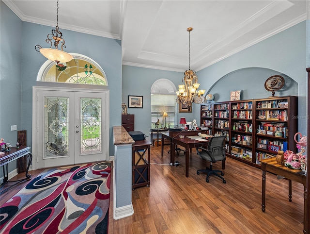148 Melissa Trl, Auburndale, FL 33823 - office space featuring wood finished floors, a chandelier, french doors, crown molding, and a raised ceiling