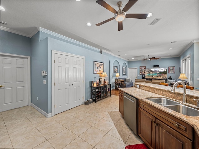 148 Melissa Trl, Auburndale, FL 33823 - kitchen featuring dishwasher, a sink, a ceiling fan, ornamental molding, and light tile patterned flooring