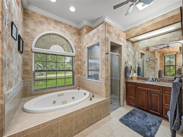 148 Melissa Trl, Auburndale, FL 33823 - bathroom with ceiling fan, a jetted tub, a stall shower, vanity, and ornamental molding