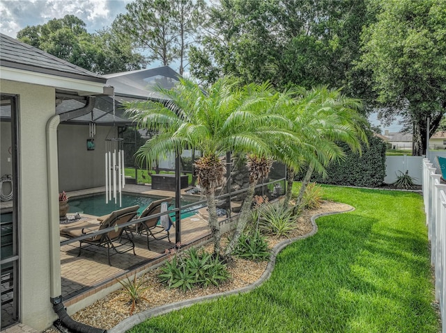 148 Melissa Trl, Auburndale, FL 33823 - view of yard with glass enclosure and a patio