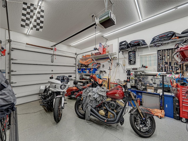148 Melissa Trl, Auburndale, FL 33823 - garage with a garage door opener and a workshop area