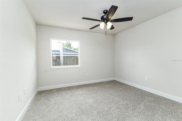 6338 Oak Sq E, Lakeland, FL 33813 - unfurnished room featuring carpet, a ceiling fan, and baseboards