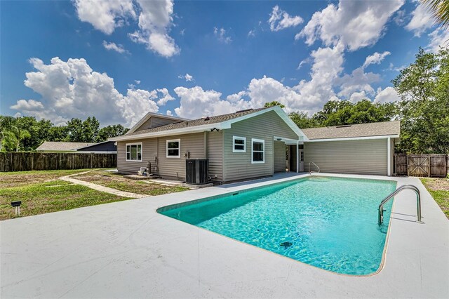 6338 Oak Sq E, Lakeland, FL 33813 - view of swimming pool with cooling unit and a patio