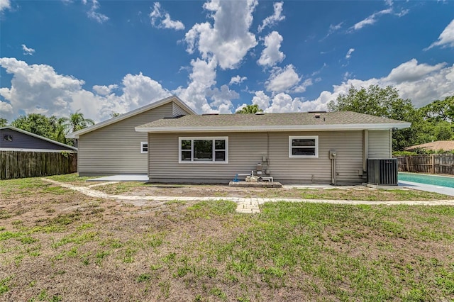6338 Oak Sq E, Lakeland, FL 33813 - back of property with a patio area and central air condition unit