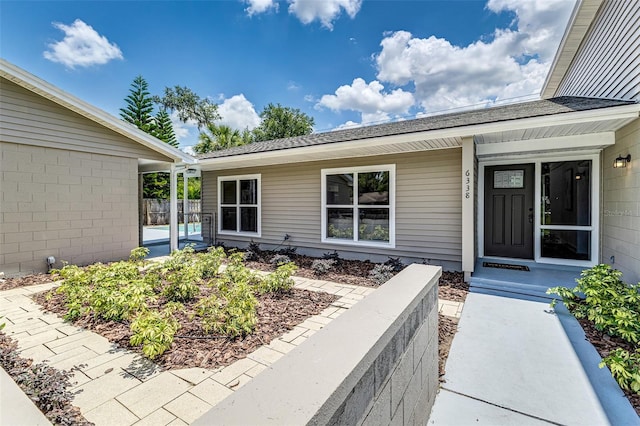 6338 Oak Sq E, Lakeland, FL 33813 - doorway to property featuring a porch