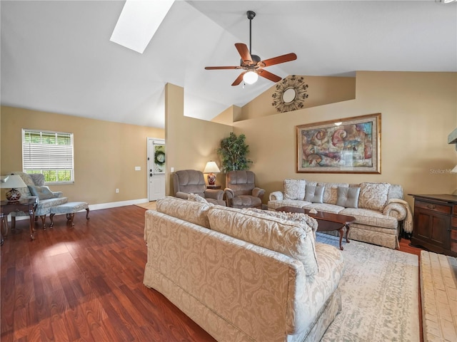2921 W Socrum Loop Rd, Lakeland, FL 33810 - living area with wood finished floors, vaulted ceiling, ceiling fan, a skylight, and baseboards