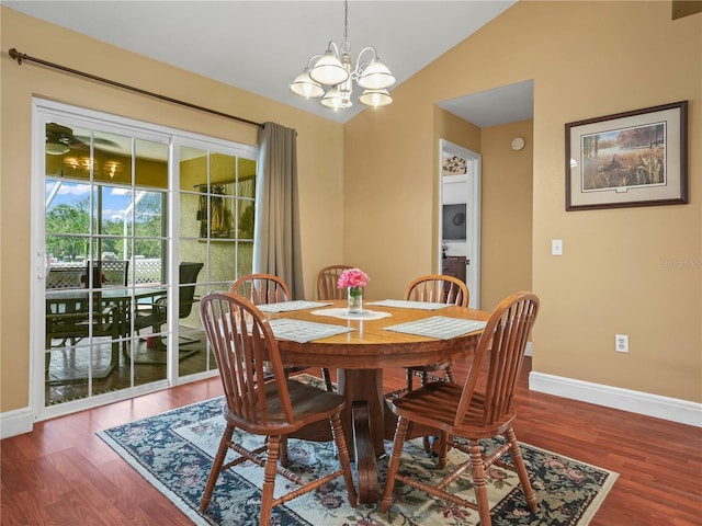 2921 W Socrum Loop Rd, Lakeland, FL 33810 - dining area with wood finished floors, baseboards, lofted ceiling, and a chandelier