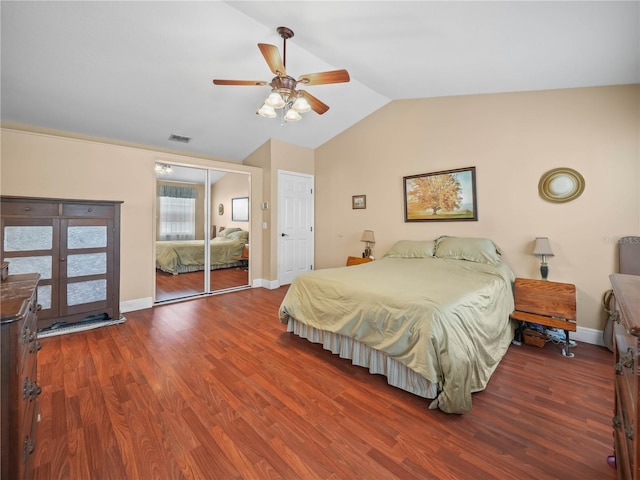 2921 W Socrum Loop Rd, Lakeland, FL 33810 - bedroom with vaulted ceiling, wood finished floors, baseboards, ceiling fan, and a closet