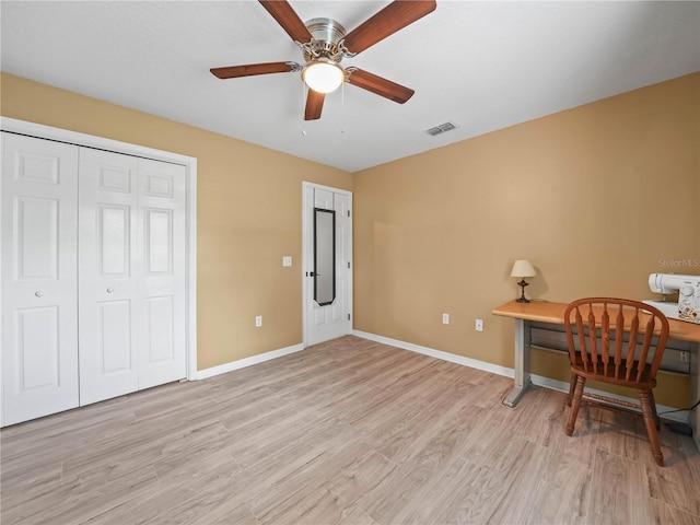 2921 W Socrum Loop Rd, Lakeland, FL 33810 - office space with light wood-style flooring, baseboards, and ceiling fan