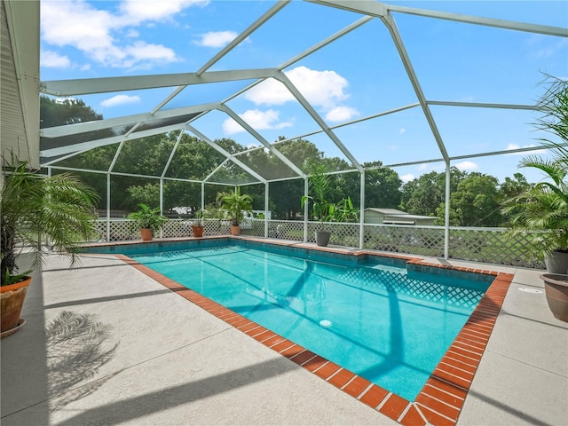 2921 W Socrum Loop Rd, Lakeland, FL 33810 - outdoor pool with a patio and a lanai