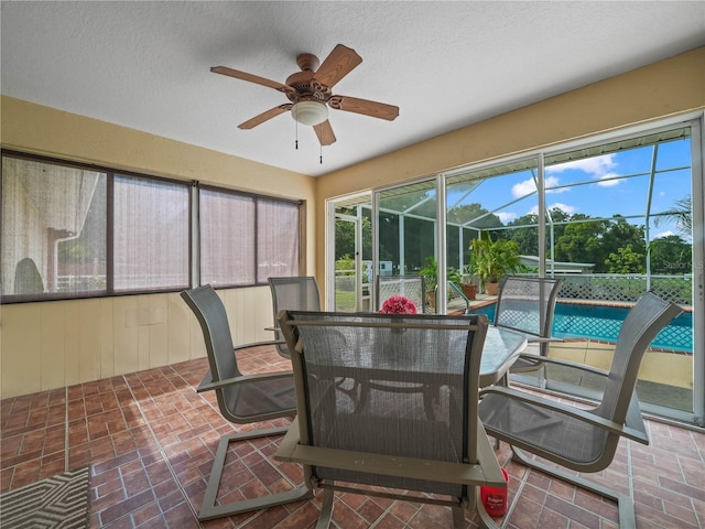 2921 W Socrum Loop Rd, Lakeland, FL 33810 - sunroom / solarium featuring a ceiling fan and outdoor dining space