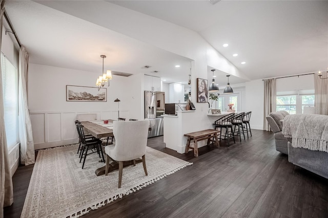 7608 Franklin Rd, Plant City, FL 33565 - dining room with a chandelier, dark wood finished floors, lofted ceiling, and recessed lighting