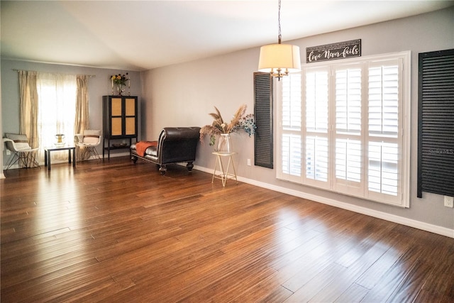 11567 Misty Isle Ln, Riverview, FL 33579 - sitting room with a chandelier, plenty of natural light, baseboards, and wood finished floors
