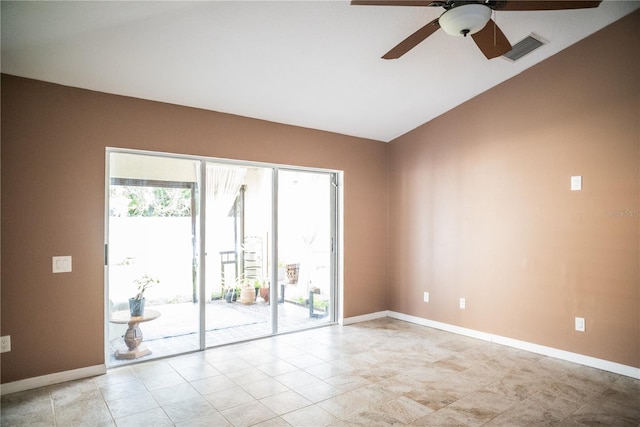 11567 Misty Isle Ln, Riverview, FL 33579 - spare room with ceiling fan, vaulted ceiling, baseboards, and light tile patterned flooring