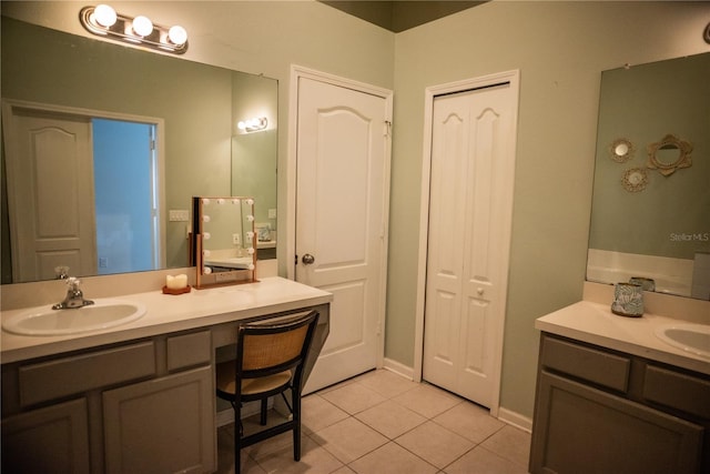 11567 Misty Isle Ln, Riverview, FL 33579 - bathroom featuring tile patterned floors and two vanities